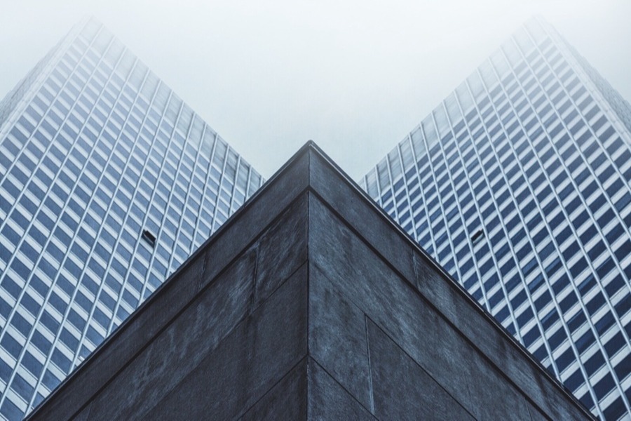 Paywalls represented by big buildings